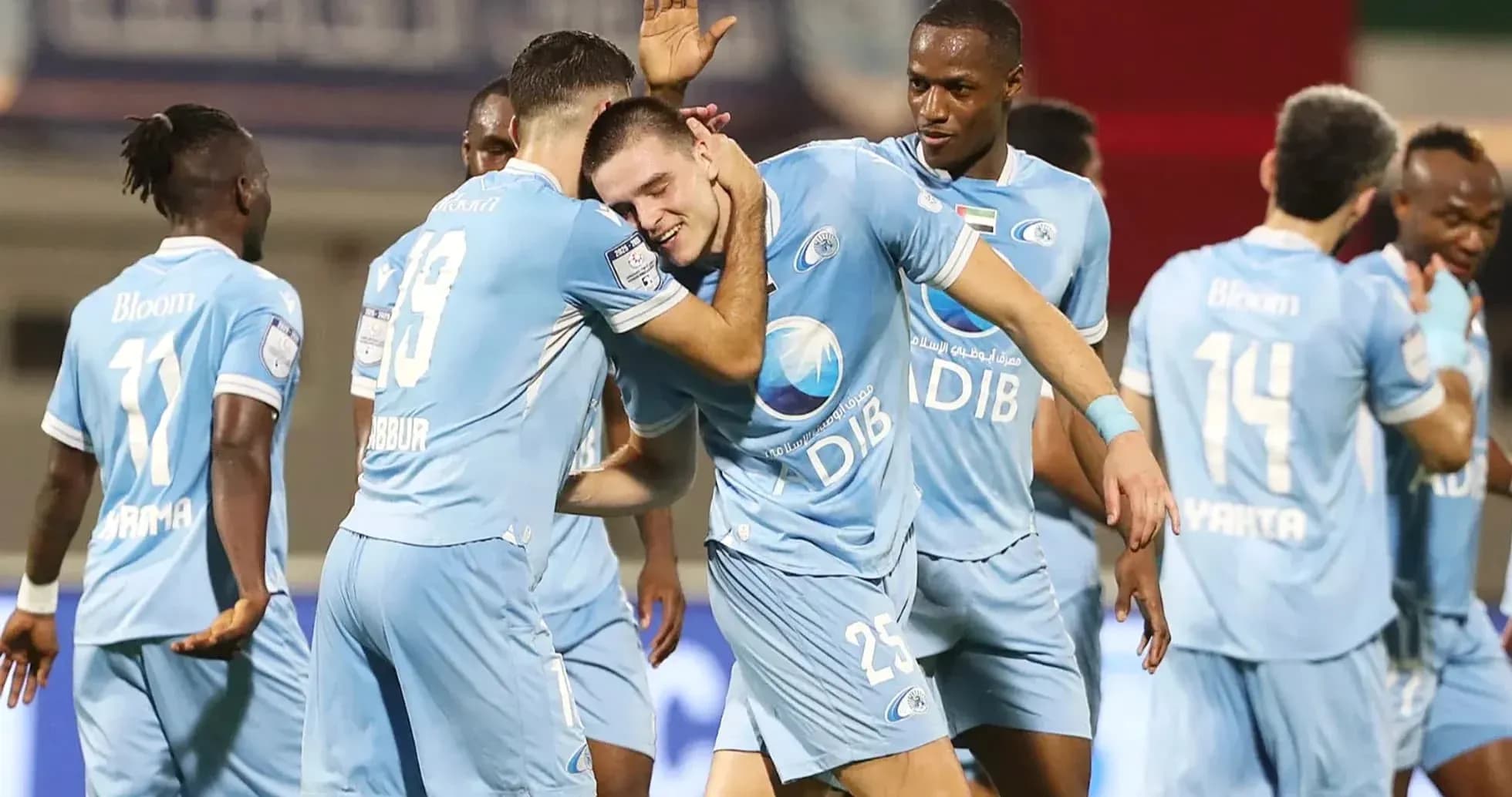 Celebración de jugadores del equipo en partido