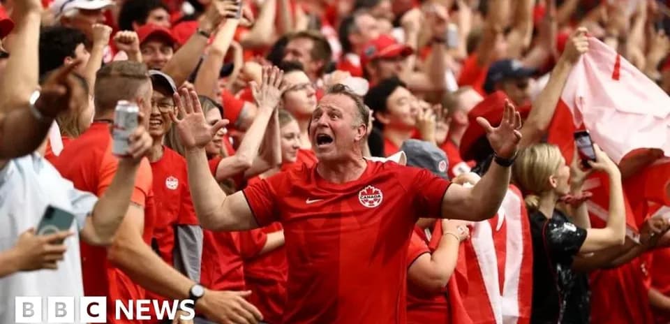 Aficionados de Canadá animando en un estadio