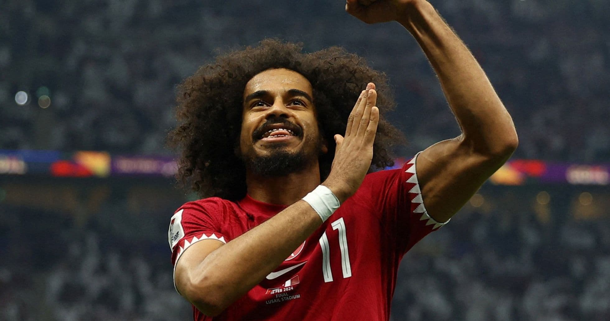 Jugador de Qatar celebrando en el Mundial