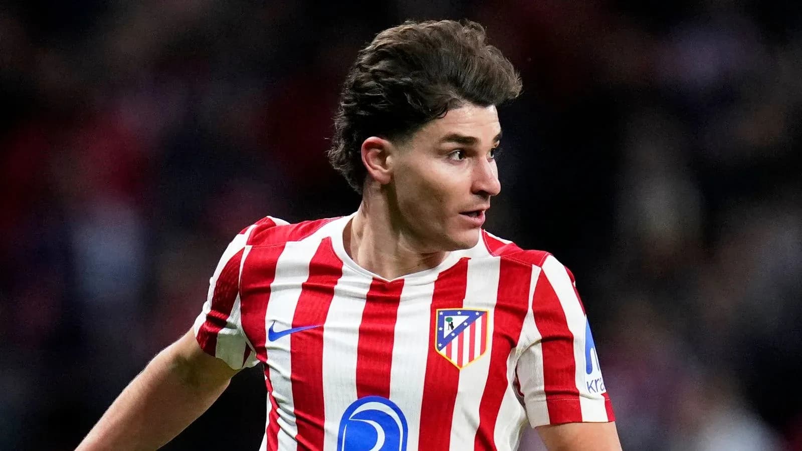 Jugador de Atlético de Madrid en acción durante el partido