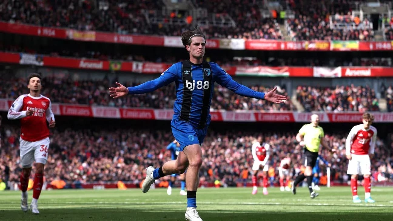 Jugador celebrando un gol en el estadio Emirates