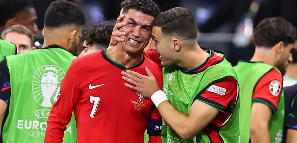 Cristiano Ronaldo interacting with teammate after match
