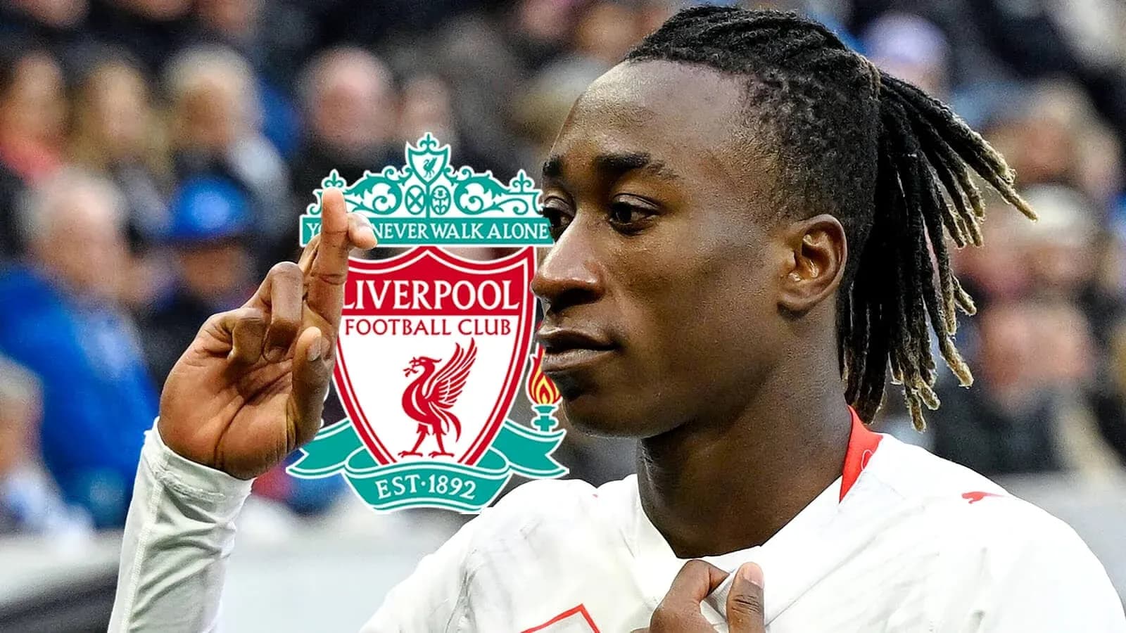 Jugador de Liverpool celebrando con gesto de la mano