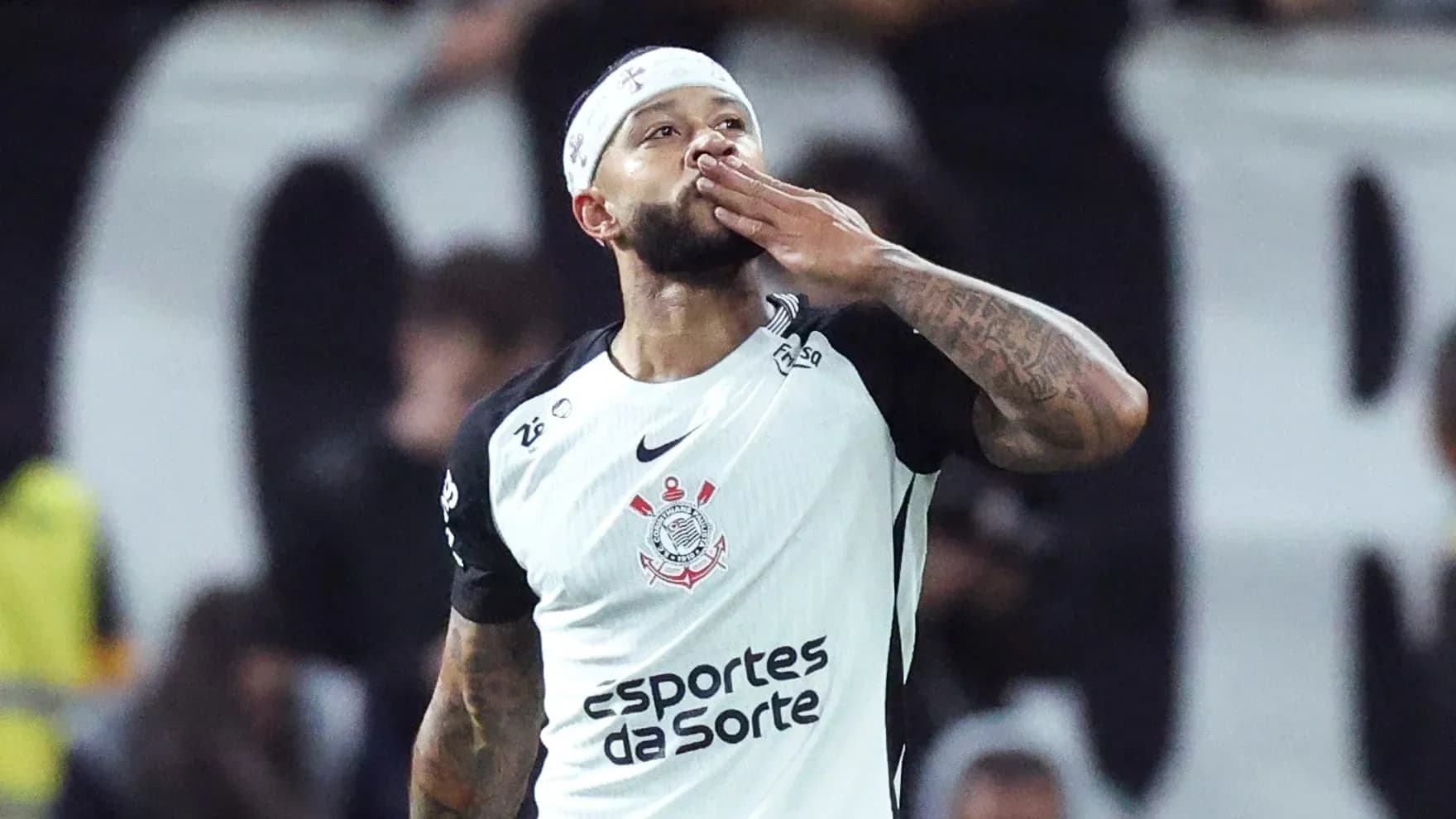Jugador de Corinthians celebrando un gol con beso Jugador de Corinthians celebrando un gol con beso