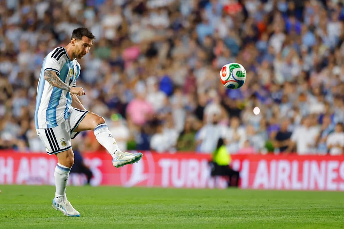 Lionel Messi preparing to kick the ball during match Lionel Messi preparing to kick the ball during match