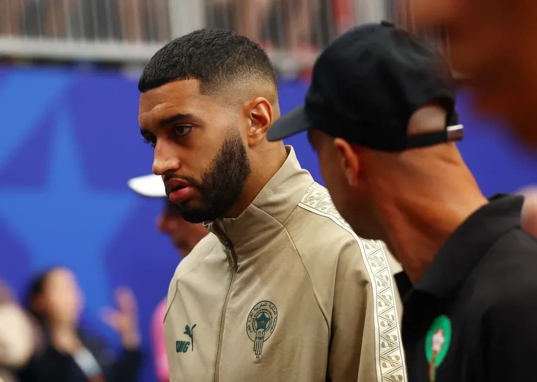 Jugador en el vestuario antes del partido Jugador en el vestuario antes del partido