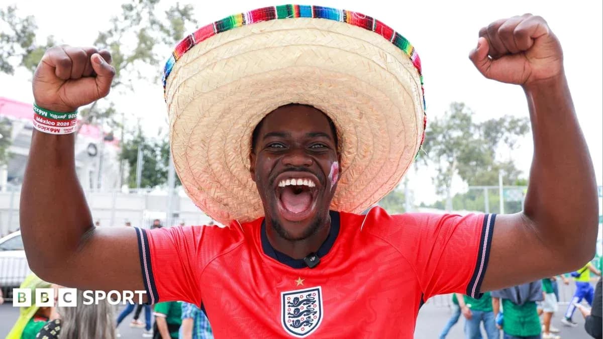 Fan in sombrero celebrating at football event Fan in sombrero celebrating at football event